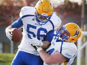 Tom Schnitzler, left, and Jack Sloboda of the Saskatoon Hilltops celebrate a touchdown on Saturday, Nov. 11, 2017, during the 110th Canadian Bowl at the University of Windsor Alumni field against the Windsor AKO Fratmen.