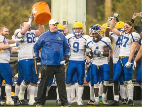 Hilltops players douse head coach Tom Sargeant while winning the 2016 Canadian Bowl in B.C.