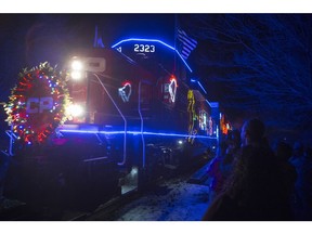 The CP Holiday Train arrives to make a stop at the 7th Avenue Railway overpass on Sunday, December 6th, 2015.