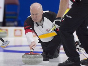 Ontario skip Glenn Howard delivers a rock at the Tim Hortons Brier on March 4, 2017. The one thing missing from Glenn Howard's impressive curling resume is an Olympic title. He'll need to win the upcoming Home Hardware Road to the Roar Pre-Trials to have a chance of getting to the 2018 Winter Games.