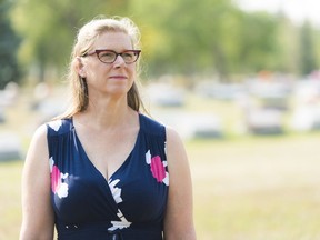 Denise Seguin Horth works as a death doula, and is shown standing at Riverside Memorial Park Cemetery. Death doulas support people in the process of dying.