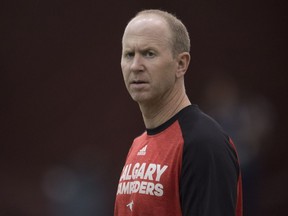 Calgary Stampeders head coach Dave Dickenson watches the action during practice Friday November 24, 2017 in Ottawa.