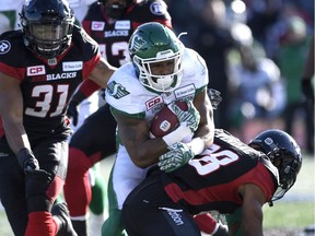 The Roughriders' Marcus Thigpen rushes for some of his 169 yards on Sunday against the Ottawa Redblacks.