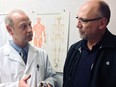 Murray Hill (right) talks with Dr. Jeffery McKerrell, a prominent Saskatoon orthopedic surgeon, about Hill's knee replacement surgery.