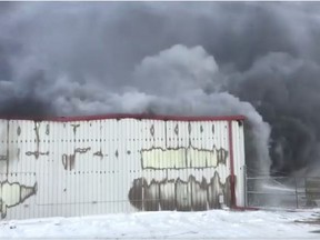 A fire in Kindersley's industrial area was brought under control on Wednesday afternoon. Forty to 50 small explosions were reported to have taken place in a building belonging to VP Energy. No one was hurt. Uploaded on Nov. 7, 2017. Screen grab of Kindersley Fire video.
Screen grab from Kindersley Fire video on Facebook