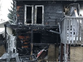 The scene of the house fire on Tuesday, Nov. 21 that resulted in the death of a dog. The fire accidentally started when a light bulb came into contact with wood panelling. No occupants were in the house.