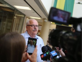 Prince Albert mayor Greg Dionne speaks with reporters on July 25, 2016. Dionne said he's excited about the sale of his city's local newspaper to its staff, saying he feels residents benefit from having access to a variety of media outlets in their community.