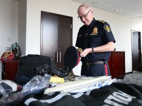 Outgoing police chief Clive Weighill packs up his office at Saskatoon Police Service headquarters on September 26, 2017.