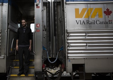 Ian, who has worked on the train for two years, takes a break in Hornepayne, Ont.