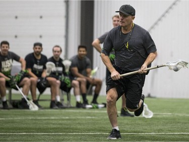 Head coach and general manager Derek Keenan takes part in a scrimmage during Saskatchewan Rush training camp at SaskTel Sports Centre in Saskatoon, SK on Saturday, December 9, 2017.