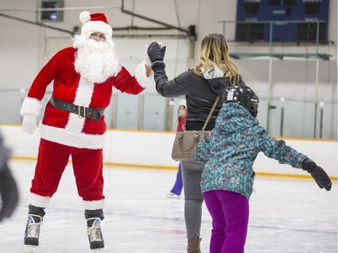 Children with Autism Spectrum Disorder ice skate with Santa and Mrs. Claus at Archibald arena in Saskatoon on Saturday, December 9, 2017.