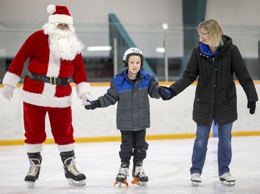 Children with Autism Spectrum Disorder ice skate with Santa and Mrs. Claus at Archibald arena in Saskatoon on Saturday, December 9, 2017.