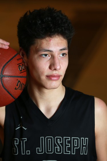 BESTPHOTO - First Nations basketball player Alan Spoonhunter is knocking on the door of elite athletics Ð he plays on the provincial team, as well as with the St. Joseph basketball team. (Michelle Berg / Saskatoon StarPhoenix)