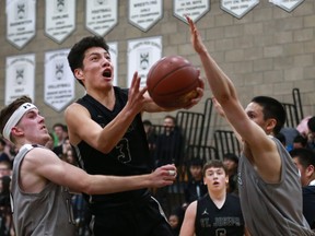 FOR KEVIN FEATURE St. Joseph Guardians' Alan Spoonhunter plays against North Battleford Vikings during the Guardian Invitational Tournament at St. Joseph High School in Saskatoon on December 14, 2017. St. Joseph Guardians won 76-62 against North Battleford Vikings. (Michelle Berg / Saskatoon StarPhoenix)