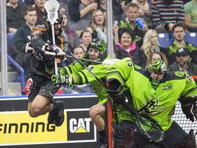 Black Wolves transition player Colton Watkinson leaps high as Ryan Dilks defends Saturday night at SaskTel Centre.