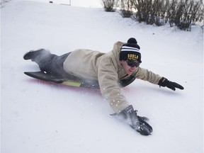 Connor Steer goes sledding down Diefenbaker Hill in Saskatoon on Wednesday, Dec. 27, 2017. Much of the province is gripped in an Arctic blast that is expected to last until the new year.