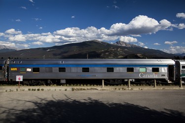 A VIA Rail passenger car stops at the station in Banff, AB.