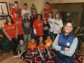 Houston Astros senior vice-president of marketing and communications Anita Sehgal, right, is shown with family members and friends while back home in Regina for Christmas.