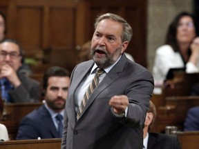 NDP Leader Tom Mulcair stands in the House of Commons during Question Period on Parliament in Ottawa, Wednesday, June 7, 2017. Former NDP leader and Quebec MP Mulcair is expected to resign in the new year.THE CANADIAN PRESS/Fred Chartrand