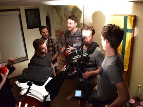 Jacob Stebner (centre) goes over a scene for The Tipping Point.