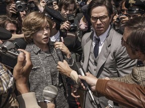 This image released by Sony - TriStar Pictures shows Michelle Williams, left, and Mark Wahlberg in a scene from "All the Money in the World." Williams was nominated for a Golden Globe for best actress in a motion picture drama for her role in the film. The 75th Golden Globe Awards will be held on Sunday, Jan. 7, 2018 on NBC.