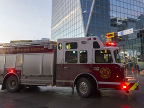 A Regina Fire and Protective Services truck turns off Scarth Street downtown.