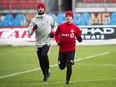 Toronto FC forward Sebastian Giovinco, right, and midfielder Victor Vazquez warm up during practice on Friday ahead of Saturday's MLS Cup final against Seattle Sounders FC