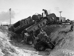 Wrecking crews clear away two locomotives from collision (B-1864 courtesy of Saskatoon Public Library)