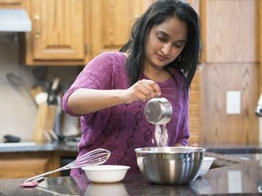 Vandana Jain, one of three finalists in CBC's Great Canadian Baking Show, bakes in her kitchen in Regina.