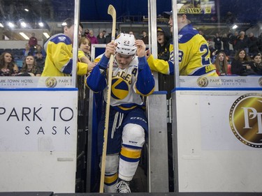 Fans and Saskatoon Blades forward  Braylon Shmyr celebrates a blades win over the Red Deer Rebels in WHL action in Saskatoon, SK on Friday, January 5, 2017.