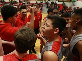 Bedford Road Redhawks get pumped up for the BRIT opening game against St. Francis Xavier at Bedford Road Collegiate in Saskatoon on January 11, 2018. The final score was St. Francis 78, Bedford Road 42.