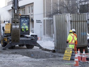 Crews work on a water main break that forced the Frances Morrison Public Library to close in Saskatoon, Sask. on Friday, January 12, 2018.