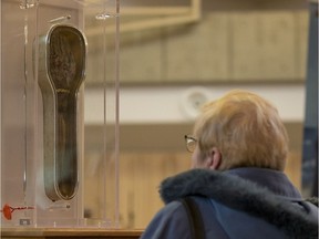 BESTPHOTO  SASKATOON,SK--JANUARY 18/2018-0119 Standalone Francis Xavier forearm- People line up to see the forearm of St. Francis Xavier at Holy Family Cathedral in Saskatoon, SK on Thursday, January 18, 2018. The forearm, which is believed to have baptized close to 100,000 people, is being taken across Canada for viewings and is available for venerations.