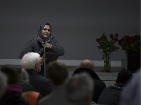 SKATOON,SK--JANUARY 29 2018-0130-NEWS-MOSQUE KILLING VIGIL- Arisha Nazir speaks during a vigil  for murder of 6 Muslim men at the Quebec Islamic Cultural Centre in 2017 held at the Islamic Association of Saskatchewan in Saskatoon, SK on Monday, January 29, 2018.