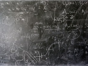 GENEVA, SWITZERLAND - APRIL 19:  A detailed view of the blackboard with theoretical physics equations in chalk by Alberto Ramos, Theoretical Physics Fellow and visitor, Antonio Gonzalez-Arroyo from the Universidad Autonoma de Madrid (both not in frame) at The European Organization for Nuclear Research commonly know as CERN on April 19, 2016 in Geneva, Switzerland.