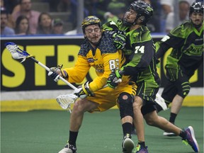 Saskatchewan's Jeremy Thompson runs into Georgia's Randy Staats during last season's NLL final.