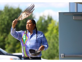 Colten Boushie's uncle Alvin Baptiste smudges inside and out of the Chief Glen Keskotagan community centre where the feast marking one year since his nephew's death is taking place in Red Pheasant First Nation on August 9, 2017.
