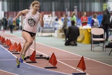 Huskies Kellie Onda-Inglis runs during the women 4x4 Relay during the University of Saskatchewan Huskies annual Sled Dog track and field meet at the Saskatoon Field House in Saskatoon, SK on Saturday, January 13, 2018.