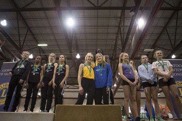 Relay winners receive their medals during the University of Saskatchewan Huskies annual Sled Dog track and field meet at the Saskatoon Field House in Saskatoon, SK on Saturday, January 13, 2018.