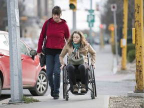 Paralympian Miranda Biletski arrives to Court of Queens Bench with her mother Sharon in Regina.