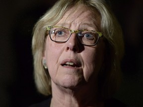 Green Party leader Elizabeth May speaks with reporters before question period in the House of Commons in Ottawa on Wednesday, May 10, 2017. The Green Party says it is "firmly behind" leader Elizabeth May in spite of recent allegations that she bullied and berated former staff. The allegations, published in the Toronto Star on Saturday, come from three former employees who allege May created a hostile work environment by yelling at and insulting employees.