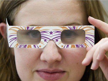 Stephanie McKay tries out rainbow glasses for the fireworks festival in 2010.