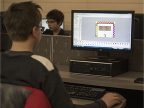 Jack MacKenzie Grade 8 student Yuval Glozman learns game design and programming in a high school setting at Campus Regina Public.