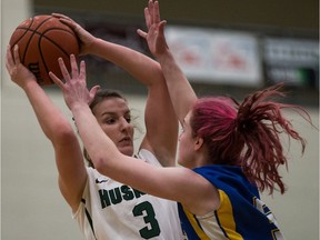 Graduating fifth-year U of S Huskies Madeline Humbert (3) and Megan Lindquist will be honoured in a pre-game ceremony at the PAC this weekend when the Huskies play host to the provincial rival University of Regina Cougars.