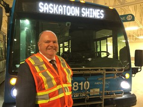 Saskatoon Transit director Jim McDonald stands in front of 15 new buses at the City of Saskatoon's civic operations centre on Tuesday, Jan. 23, 2018. The new buses have been purchased with the help of federal transit funding and are intended to reduce the average age of the city's but fleet. (PHIL TANK/The StarPhoenix)