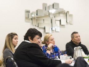 Hazel Dixon, foreground, elder-in-residence at Regina Public Schools, and her colleagues listen to a presentation during Mental Health First Aid First Nations. The session was held to train participants to better help Indigenous students, who report higher levels of anxiety than non-Indigenous students.