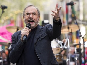 FILE - In this Oct. 20, 2014 file photo, Neil Diamond performs on NBC's "Today" show in New York. Diamond is retiring from touring after he says he was diagnosed with Parkinson's disease. Diamond turns 77 on Wednesday. Jan. 24, 2018, and will get the lifetime achievement award at Sunday's Grammy awards.