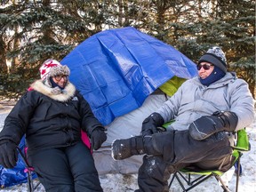 Jenny Gardipy, left, and Lamarr Oksasikewiyin laugh together during a winter camping workshop held at the Living Skies Retreat Centre in the Lumsden Valley. They were cracking jokes and in good spirits despite the frigid temperatures they would have to endure during their overnight stay.