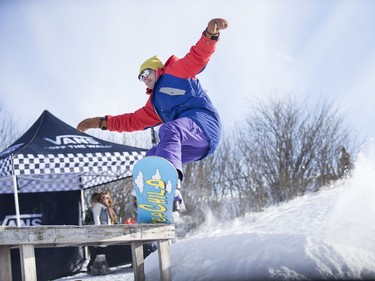 Chris Dziki rides down the hill during an event in support of the construction of a recreation park for winter and summer use in Diefenbaker Park in Saskatoon on Saturday, February 3, 2018.