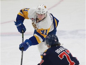 Saskatoon Blades' Logan Christensen moves the pick up ice against the Regina Pats during first period action in Saskatoon, SK at SaskTel Centre on February 11, 2018.